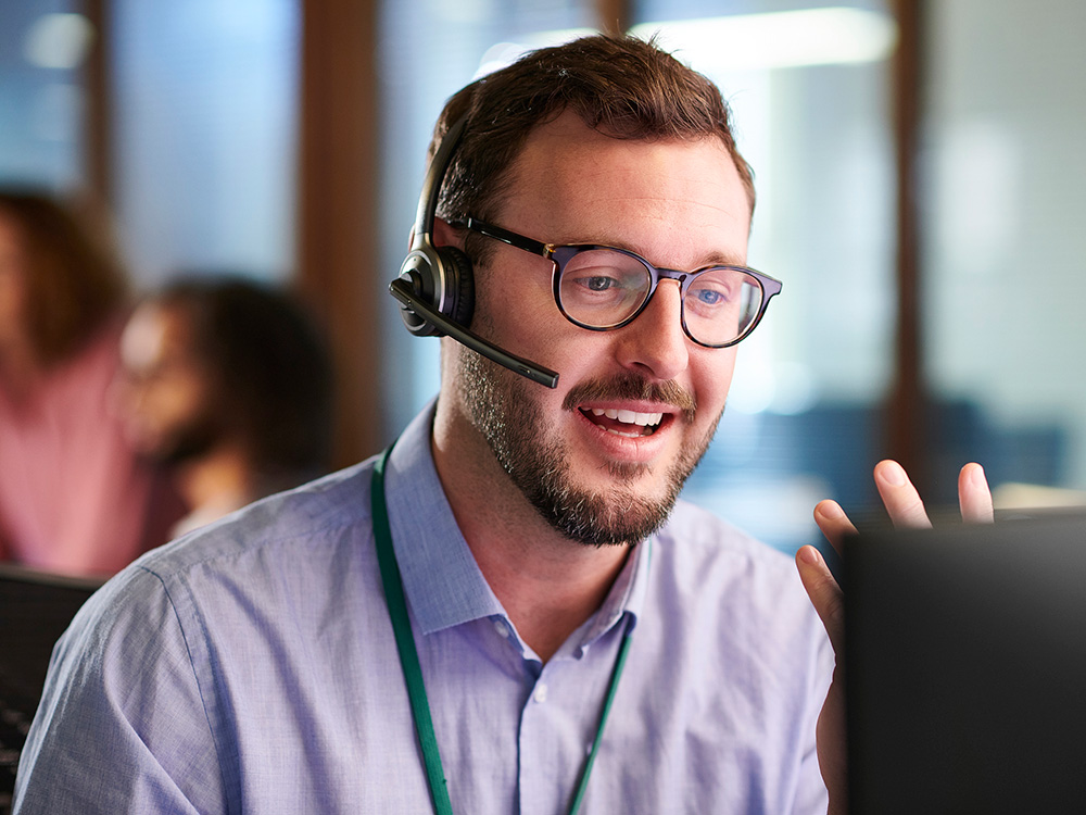 man on a call in an office